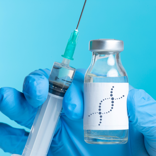 Needle and vaccine bottle with DNA on label